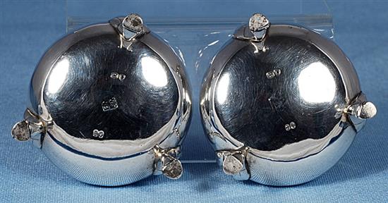 A pair of Victorian silver circular bun salts, 7.8oz/244 grams.